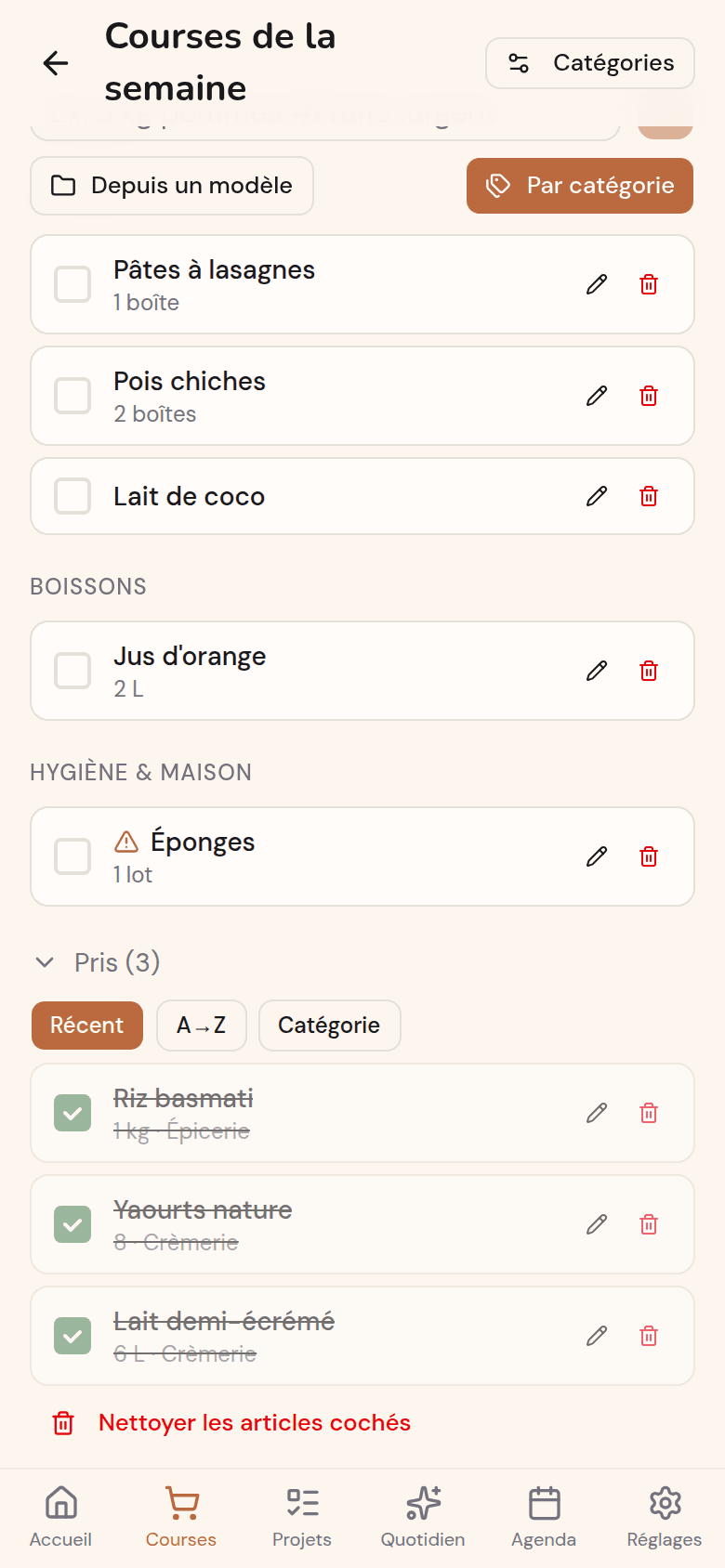Liste de courses Kotidy avec la section « Pris » et les articles déjà cochés